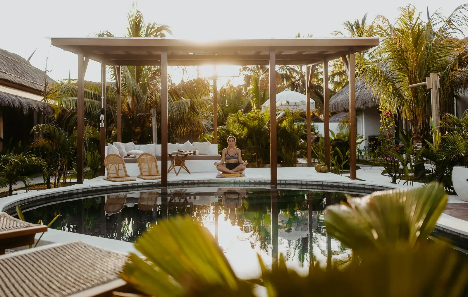 The pool and garden at Luana Lombok in Selong Belanak at golden hour